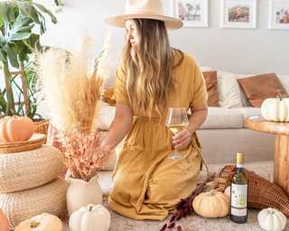 Pro tip: KRIS Pinot Grigio makes the perfect sidekick while decorating for fall. #KRISwine